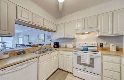 Windy Hill Condo | Oceanview condo overlooking the beach and pool, minutes from everything!