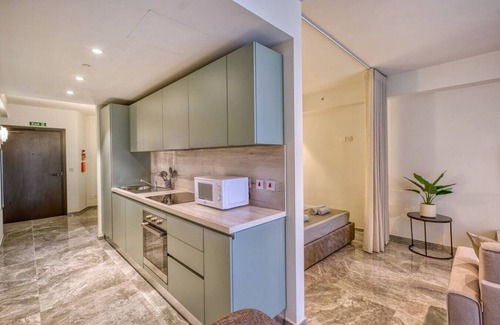 Paceville Apartment | Official Mercury Suites | With Rooftop Pool Access