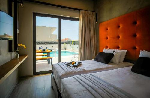 Laganas Apartment | Old Cinema Suites - Stylishly Decorated Retreat with Pool or Jacuzzi by the Sea in the Heart of Laganas Βy Villa Mana Gers