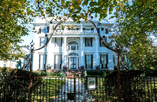 Bristol Cottage | Old fashioned designer front porch living by the sea with expansive water views.