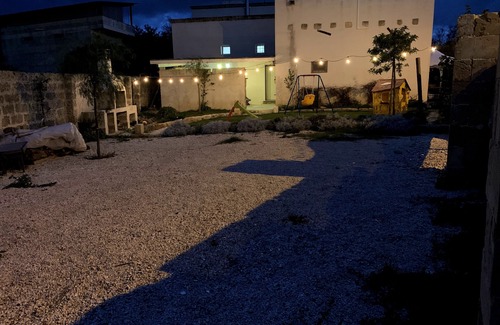 Lequile House | Old renovated millstone with jacuzzi