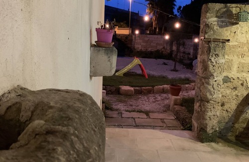 Lequile House | Old renovated millstone with jacuzzi