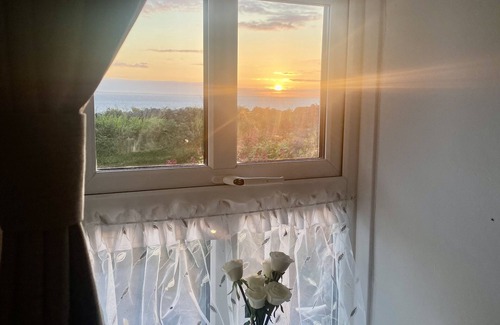 Ballyvaughan Cottage | Old Thatch Cottage in the Burren views over Galway Bay on the Wild Atlantic Way