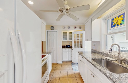 Old Village House | Old Village hideaway with covered porches, grill, alfresco dining & fenced yard