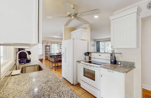 Old Village House | Old Village hideaway with covered porches, grill, alfresco dining & fenced yard