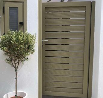 Skiathos Town House | Olive green house