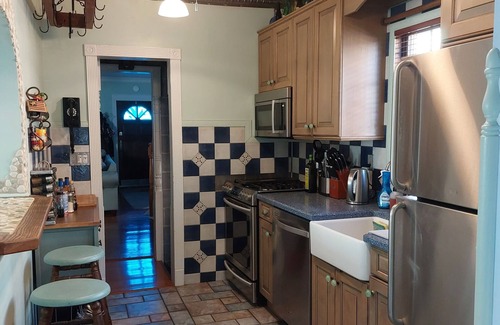 Long Beach House | "Once Upon a Tide" eclectic beach house with pizza oven, game room, fireplace