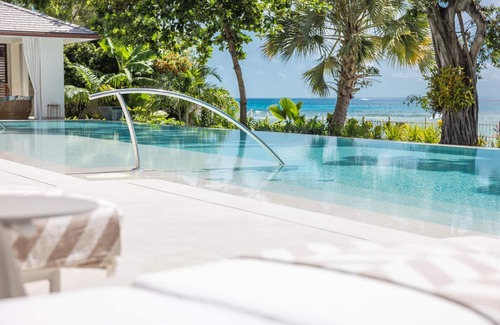 Sunset Crest Villa | One Beachlands - Luxury Beachfront Mansion by One Caribbean Estates