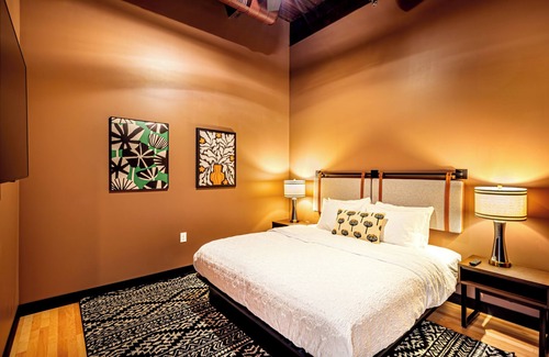 Madison Hotel | One Bedroom King with Den with views of the heart of downtown.