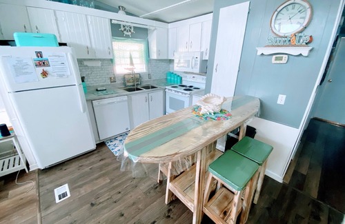 Garden City House | One minute drive to beach with golfcart! Updated, beach decor & clean!