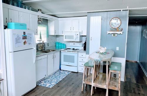 Garden City House | One minute drive to beach with golfcart! Updated, beach decor & clean!