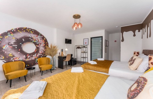 Historical Center Bruges Hotel | Our Giant Chocolate Donut Room by Homer Simpson - Perfect for up to 4 guests.