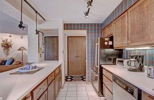 Peak 9 Condo | Outdoor Pool! Walk to downtown Breckenridge & ski lifts! Private balcony, garage