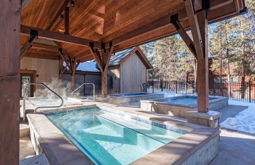 Peak 9 Condo | Outdoor Pool! Walk to downtown Breckenridge & ski lifts! Private balcony, garage