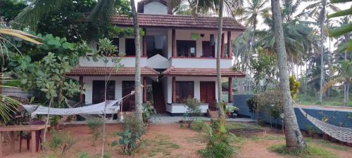 Varkala Apartment | paddy farm beach resort odayam varkala