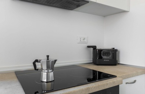 San Donato-San Vitale Apartment | Palazzo Pedretti 101, Cozy Apt Close To Centre By Halldis