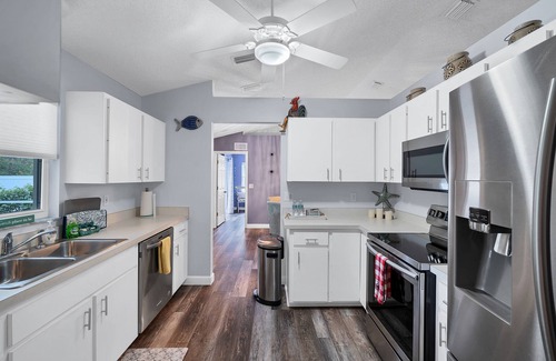 Sarasota House | Palm Aire Golf Course home in Sarasota near Benderson Park, UTC and beaches.