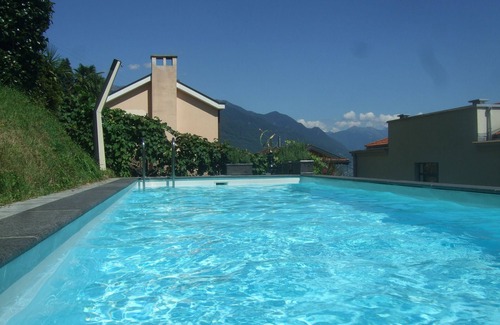 Orselina Apartment | Palm trees, Pool and Panorama: Casa Belsito, Orselina, on Lake Maggiore