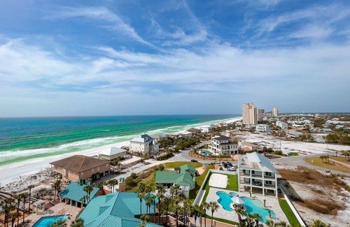 Gulf Pines Condo | Paradise Found: Experience Beachfront Accommodations ~ Resorts Largest Pool Deck