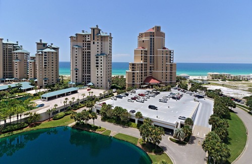 Gulf Pines Condo | Paradise Found: Experience Beachfront Accommodations ~ Resorts Largest Pool Deck