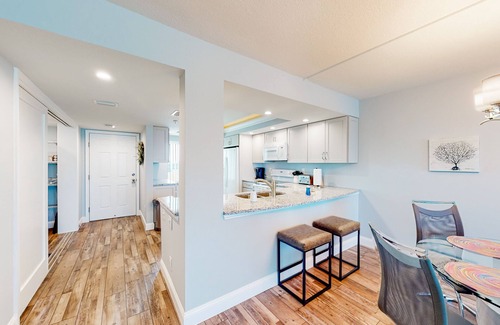 Madeira Beach Condo | Parrot's Cove | Condo in Madeira Beach with a heated pool