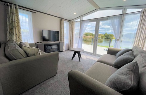 Lockerbie House | Pass the Keys | Lakeside Shooting Fishing Lodge Sleeps 6 HTub
