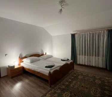 Bughea de Jos Villa | Pensiunea Poiana Luminoasă