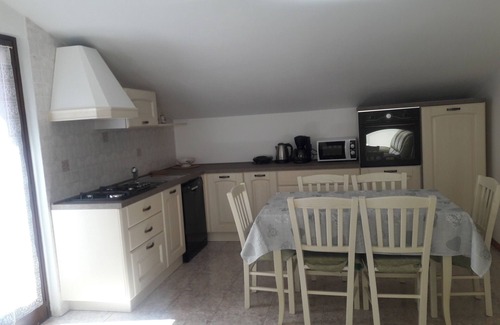 Navene Apartment | Penthouse with terrace overlooking Lake Garda in Malcesine (VR)