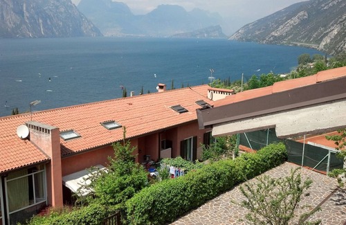 Navene Apartment | Penthouse with terrace overlooking Lake Garda in Malcesine (VR)