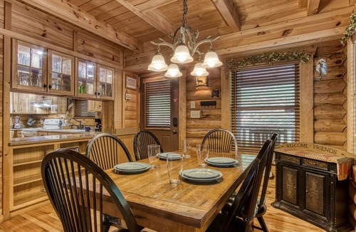 Sevierville Cabin | Pet-Friendly 3-Level Cabin w/Views, Game Room & Hot Tub – Sleeps 12