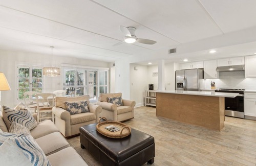 American Beach Condo | Pet Friendly | Ground Floor Sailmaker Villa | Covered Patio with Pool View