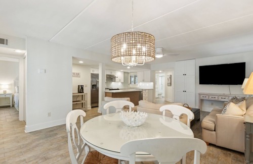 American Beach Condo | Pet Friendly | Ground Floor Sailmaker Villa | Covered Patio with Pool View