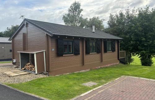 Newcastleton House | Pet Friendly - Lodge at Riverview Holiday Park