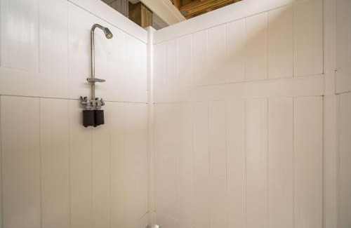 Yaupon Beach House | Pier Walker by Oak Island Accommodations