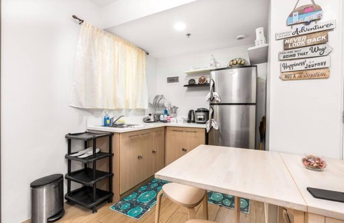 Tagaytay Apartment | PineSuites Relaxing 2-bedroom condo with pool and garden view accepts small pets only