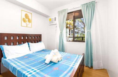 Tagaytay Apartment | PineSuites Relaxing 2-bedroom condo with pool and garden view accepts small pets only