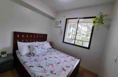 Tagaytay Apartment | PineSuites Relaxing 2-bedroom condo with pool and garden view accepts small pets only