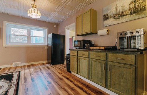 Manitowoc Apartment | Pink Door Loft - Conveniently located in the downtown district of Manitowoc