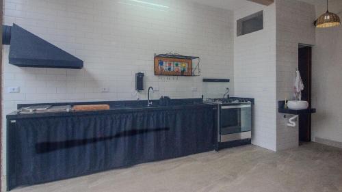 Tupy House | Piscina Aquecida, 4 Suítes, Bilhar, Área Gourmet