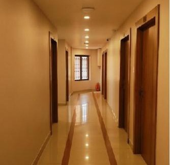 Kannur Hotel | Plaza Tourist Home