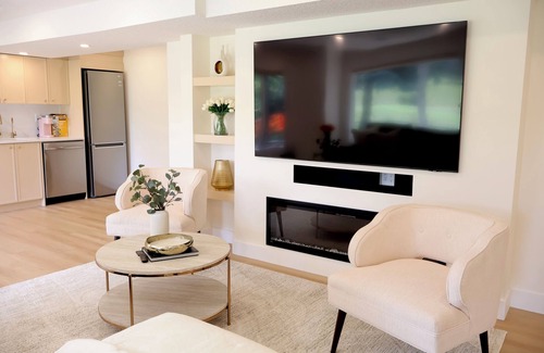 Valley Ridge House | Pond View 2 Bedroom Walkout Basement Suite on Golf Course with Fireplace & Sauna
