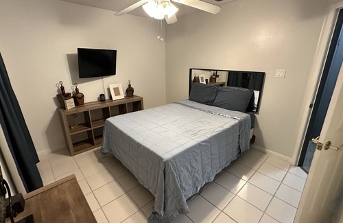 Lutz House | Pool House queen bed