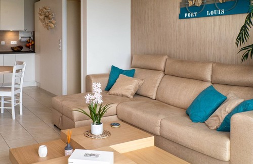 Port-Louis Apartment | Port-Louis: 1-Bedroom Apartment with Terrace, Parking and Wifi