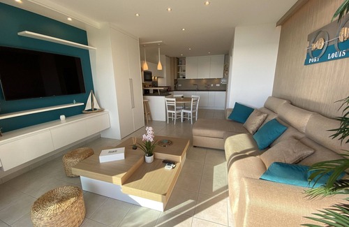 Port-Louis Apartment | Port-Louis: 1-Bedroom Apartment with Terrace, Parking and Wifi