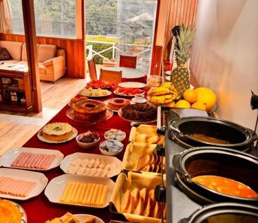 Vila Telma House | Pousada Araucária Suítes