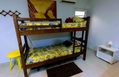 Pereque Apartment | Pousada Ideal Guarujá - Estúdios Mobiliados, Ar-Condicionado e Cozinha