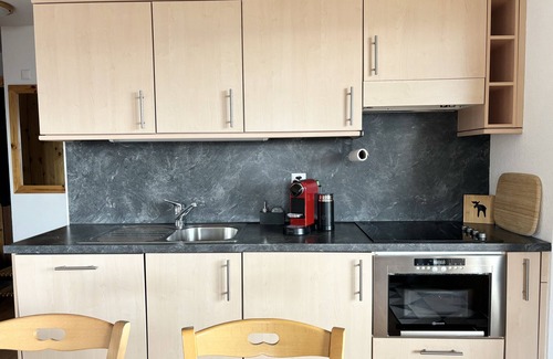 Saint-Pierre-de-Clages Apartment | Pracondu apartment, ski-in ski-out, with views of the Alps