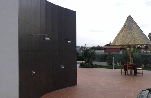Fanusa Villa | prestigious villa with swimming pool surrounded by greenery near the sea