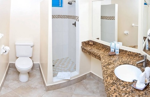 St. Lawrence Gap Hotel | Prime Location! Onsite Pool, Free Parking, Oceanfront, Near Turtle Beach