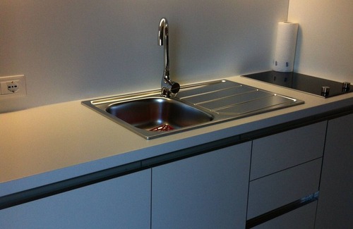 Riva del Garda Apartment | Private apartment with a balcony and roof deck close to the lake